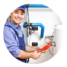 plumber working on a heater